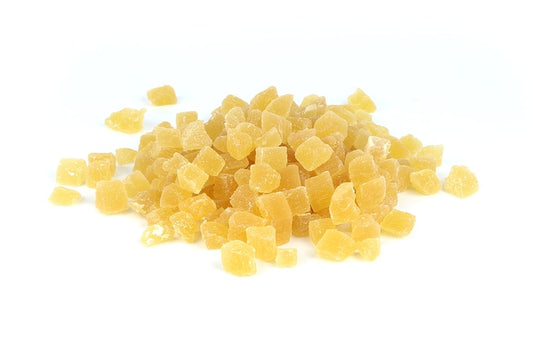 A Pile Of DIced Pineapple On A White Background