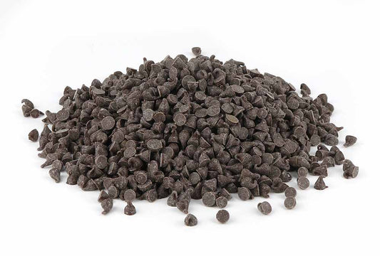 A Pile Of Dark Chocolate Chips On White Background