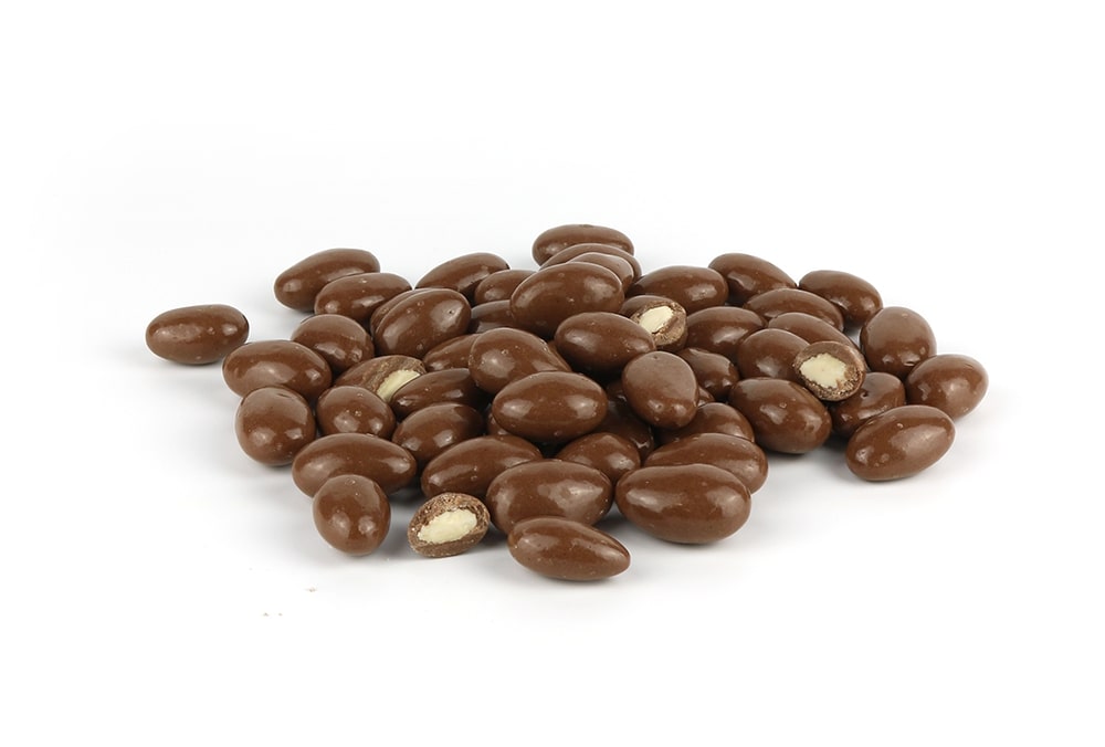 A Pile Of Milk Chocolate Almonds On A White Background