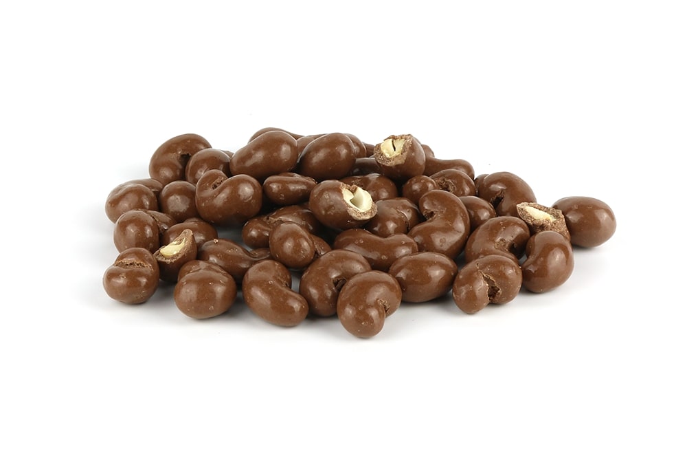 A Pile Of Milk Chocolate Cashews On A White Background