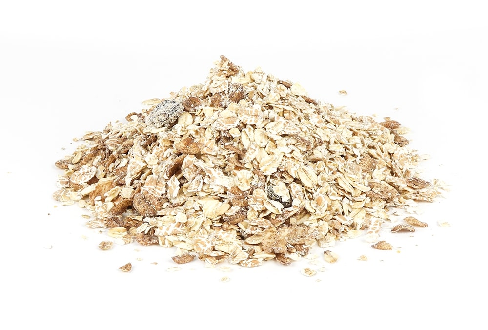 A Pile Of Fruity Muesli On A White Background