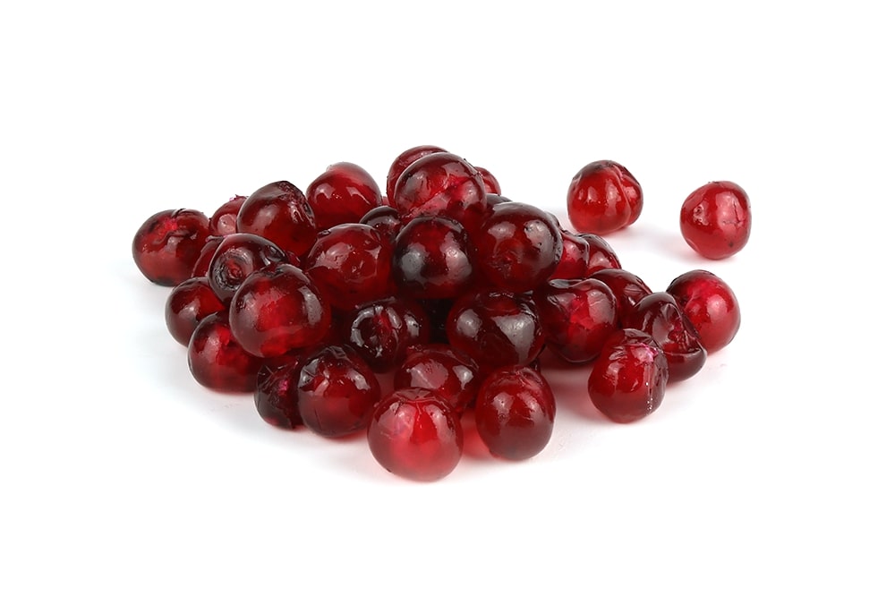 A Pile Of Red Cherries On A White Background