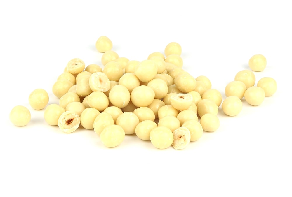 A Pile Of Yogurt Hazelnuts On A White Background